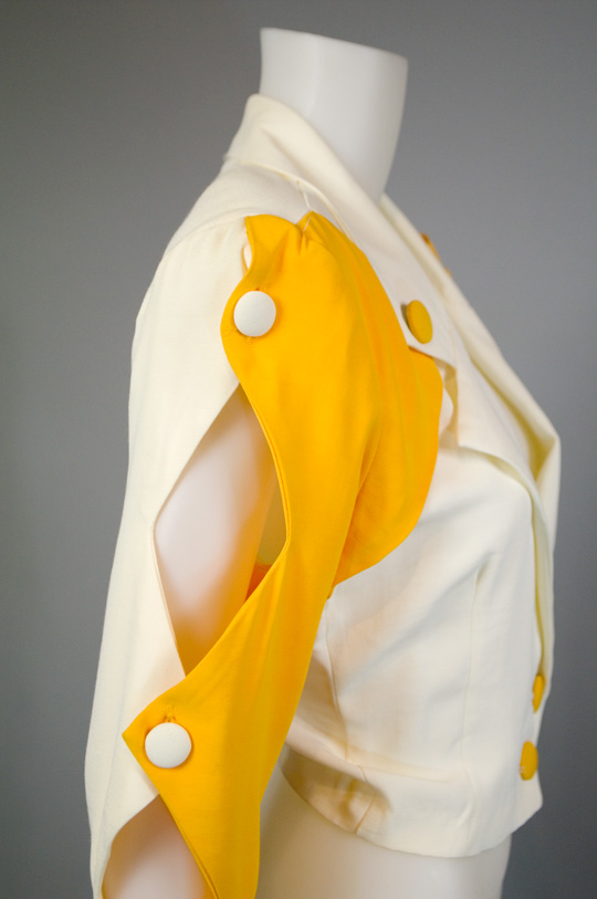 1980s clothing trend cut out shoulders