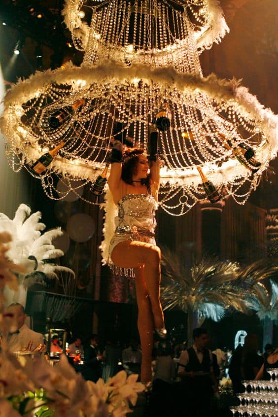 A woman hanging off the ceiling.