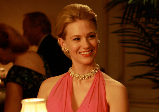 colorful and bold jewelry worn on betty draper in mad men