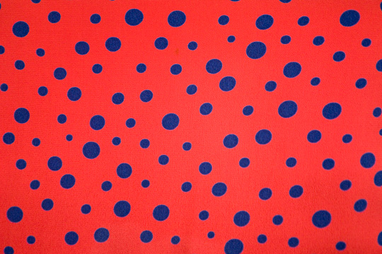 the polka dot print of a 1940s rayon dress