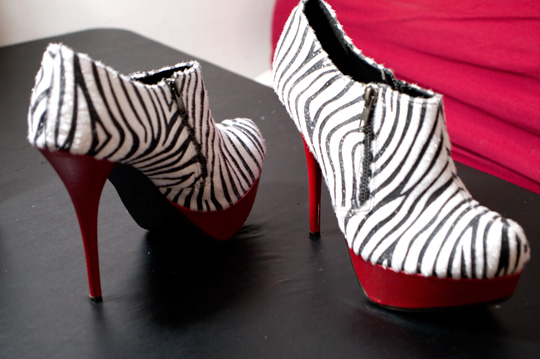 zebra print red heeled shoes