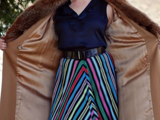 woman wears a vintage fashion striped skirt