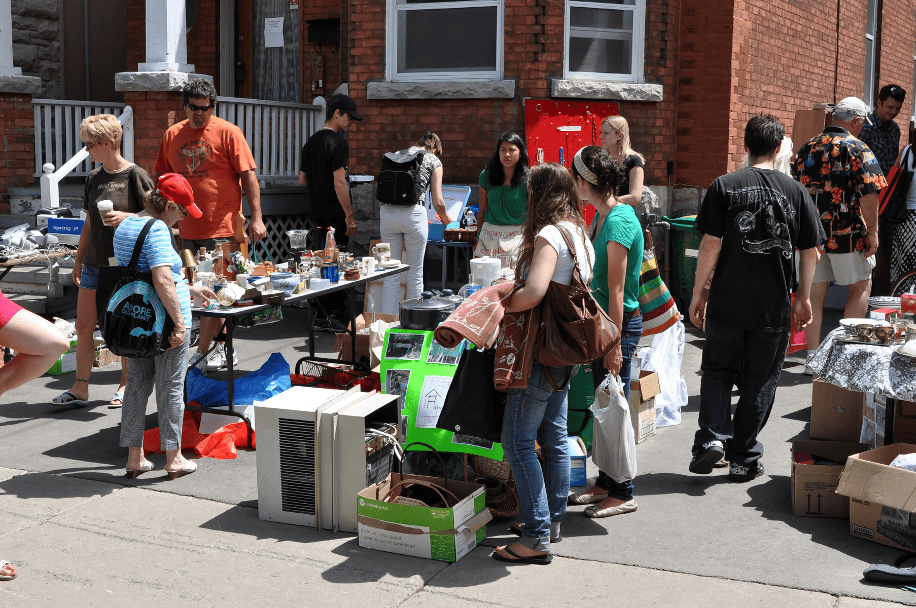 Selling unusual items at a garage sale.