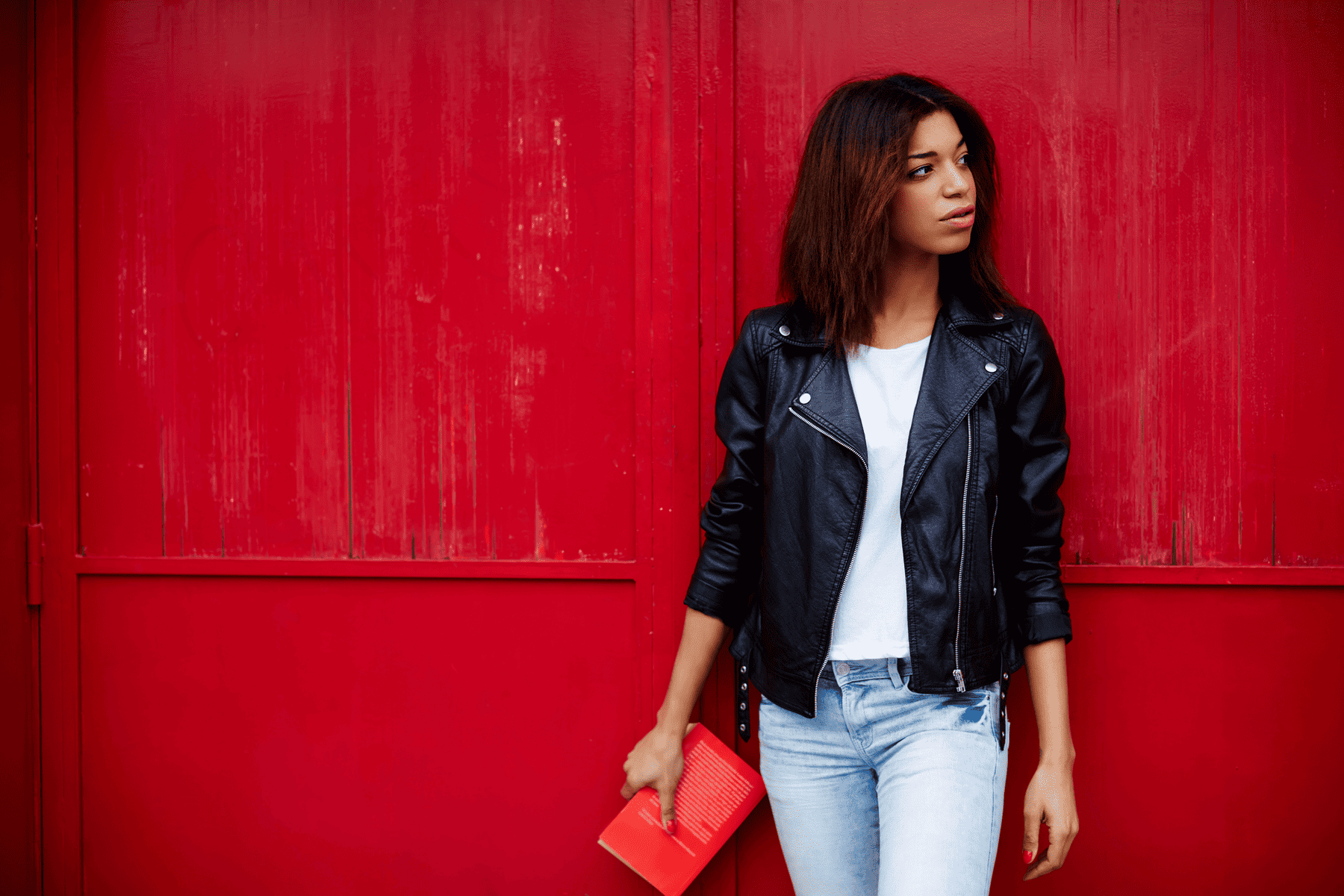 A model wearing a leather jacket.