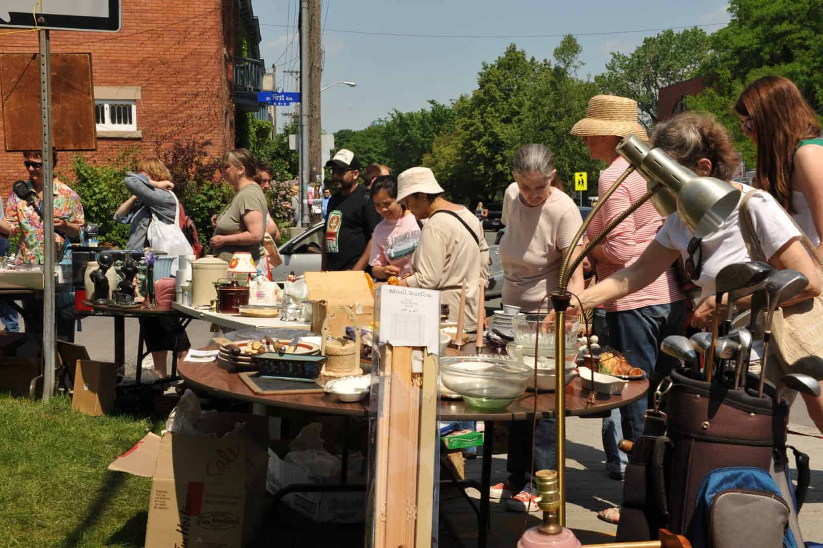 A garage sale full of people.