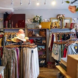 A person in a clothing store AI-generated content may be incorrect.