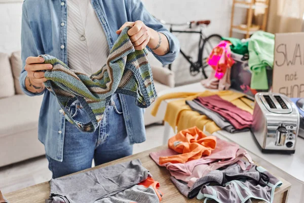 Exchange Market Partial View Tattooed Woman Sorting Clothing Holding Knitted — Stock Photo, Image